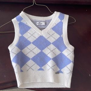this is a hollister sweater vest. it has only been worn 2 times.